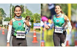 Runner finds lost puppy during Marathon, carries him to the finish line